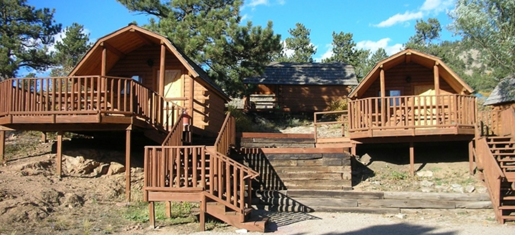 photo of KOA camping cabins in rustic environment